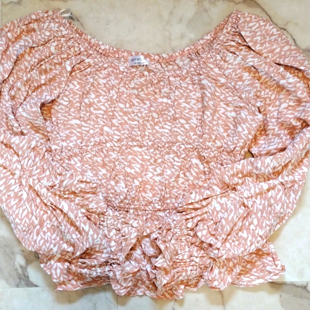 Shop Neighbor floral print off shoulder top.